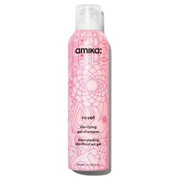 Amika reset shampoo front packaging showing bottle and branding for clear benefits