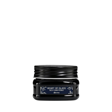 Davines front packaging shows compact conditioner for travel convenience