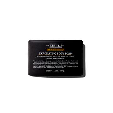Kiehl's front packaging of exfoliating body bar showing product and woodsy scent benefit