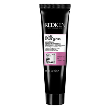 Redken bottle front view showing product and immediate shine benefits