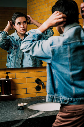 18.21 Man Made label detail focusing on scent name and paraben-free benefit