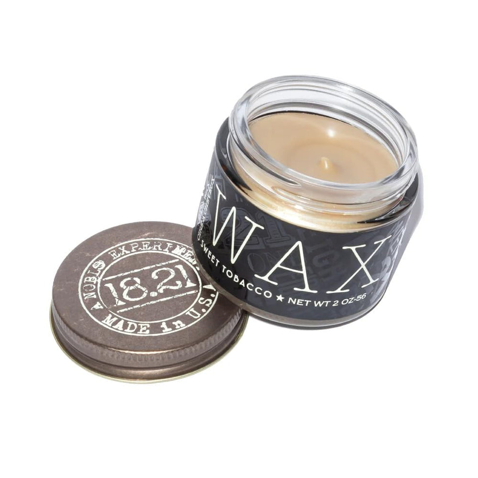 18.21 Man Made front jar showing Sweet Tobacco wax and compact travel size benefit