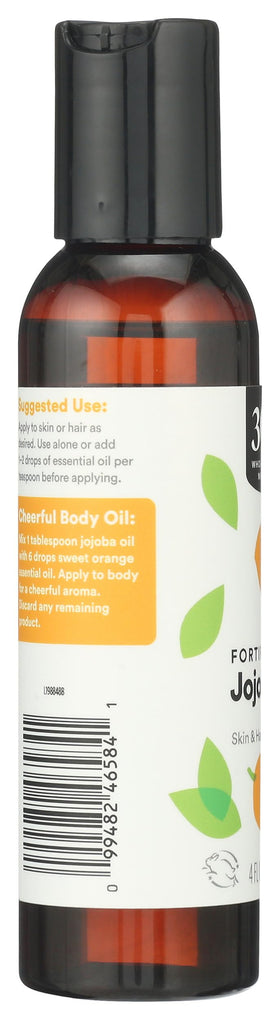 365 by Whole Foods Market applying oil to hair ends to reduce frizz and add shine