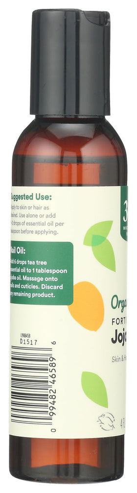 365 by Whole Foods Market applying oil to hair ends showing frizz control benefit