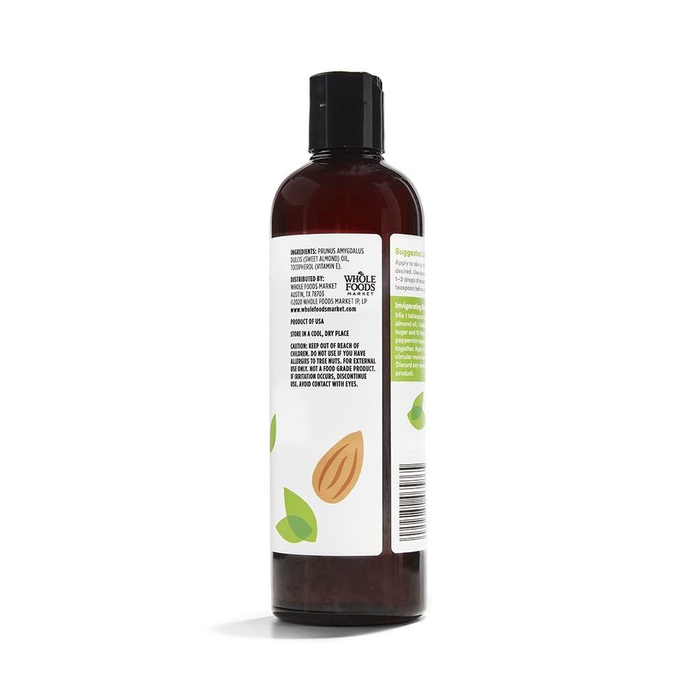 close-up pour of 365 almond oil texture demonstrating smooth absorption benefit