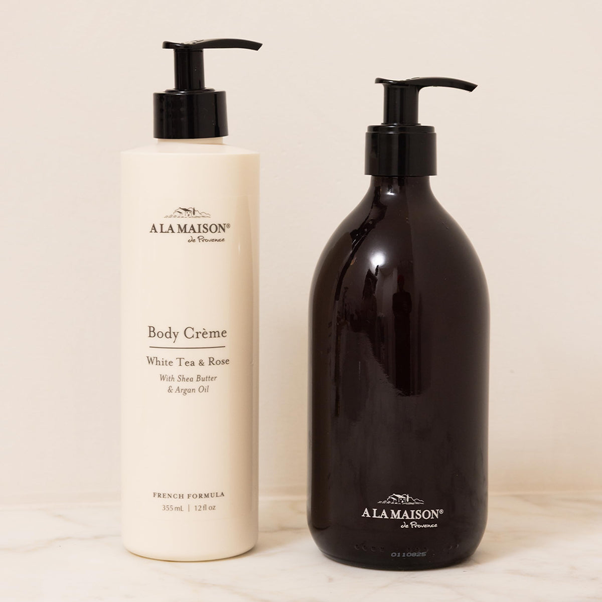 A LA MAISON natural oils display with argan avocado shea showing nourishing trio