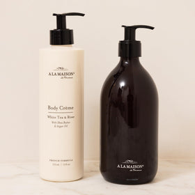 A LA MAISON natural oils display with argan avocado shea showing nourishing trio