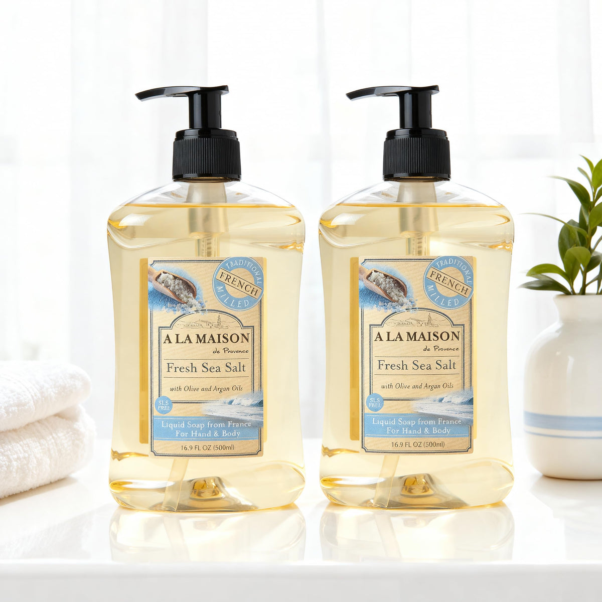 A LA MAISON creamy foam texture on palm demonstrating gentle lather benefit