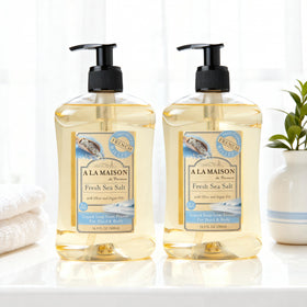 A LA MAISON creamy foam texture on palm demonstrating gentle lather benefit