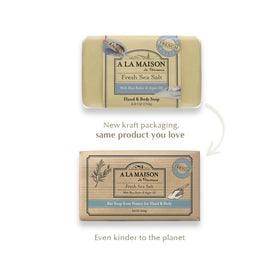 Rich lather from A LA MAISON soap in hand, demonstrating creamy cleansing