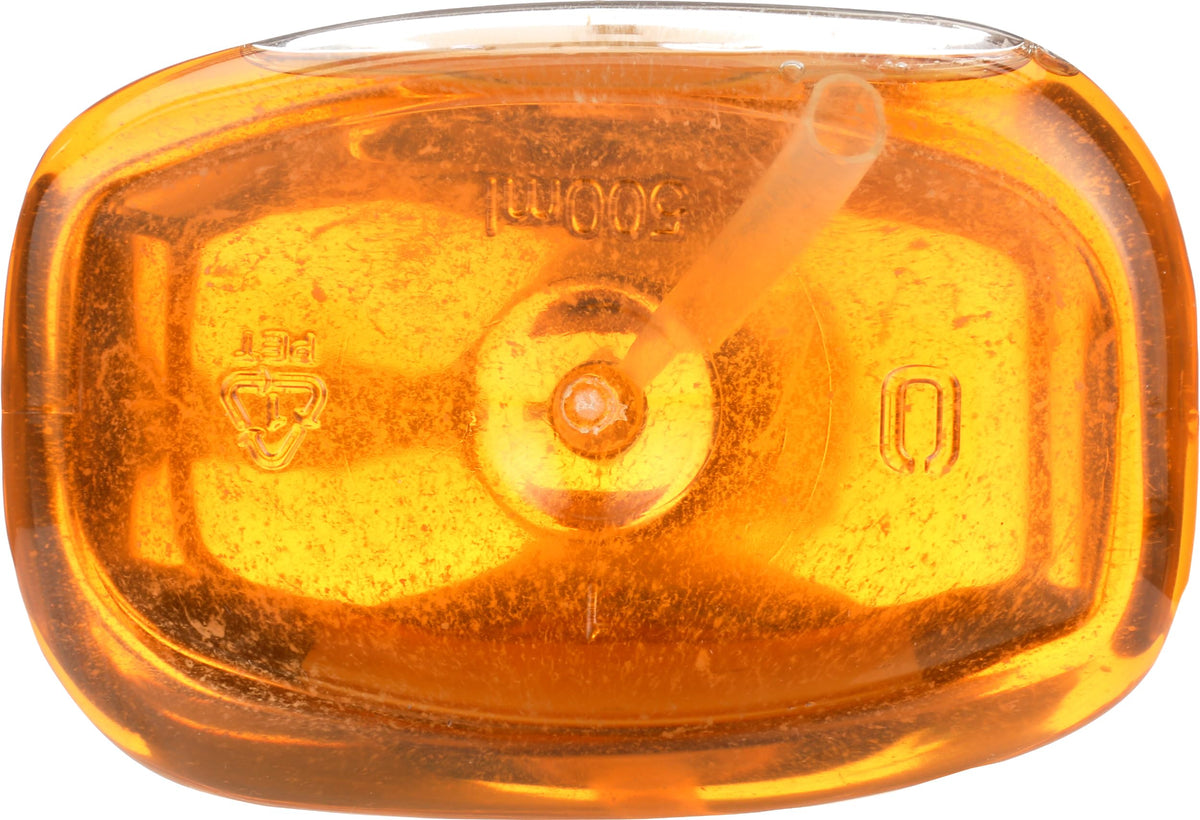 A LA MAISON bottle with recycling symbol showing biodegradable packaging benefit