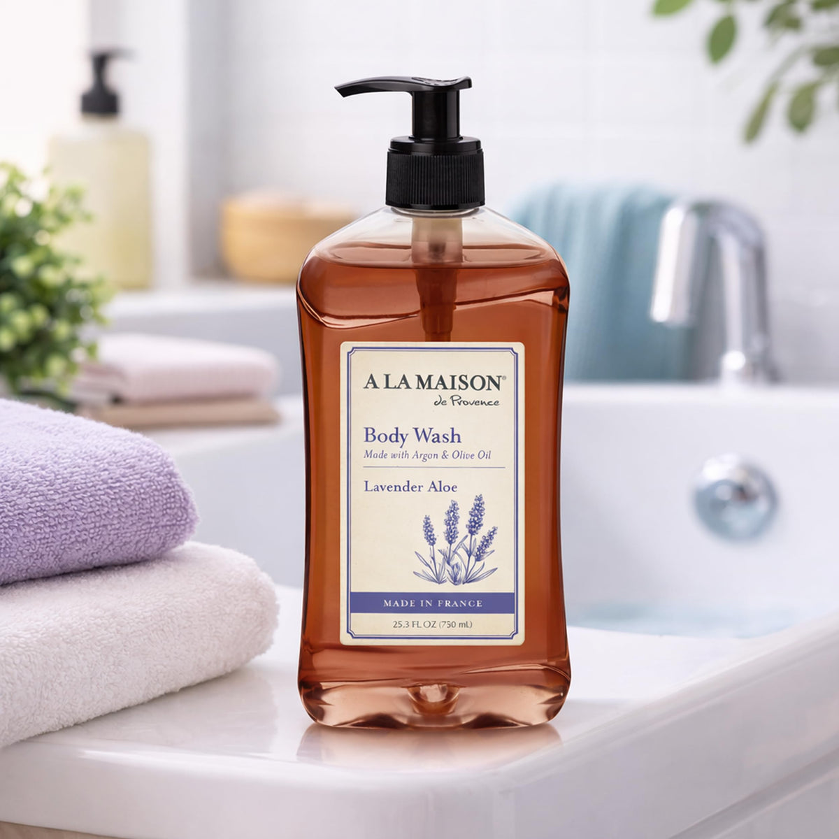 A LA MAISON bottle beside common items showing 25.36 fl oz capacity benefit