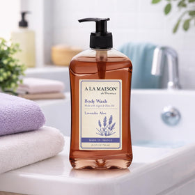 A LA MAISON bottle beside common items showing 25.36 fl oz capacity benefit