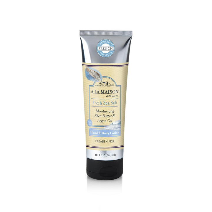 A LA MAISON front bottle showing sea salt lotion and fresh coastal design, highlights quick absorption