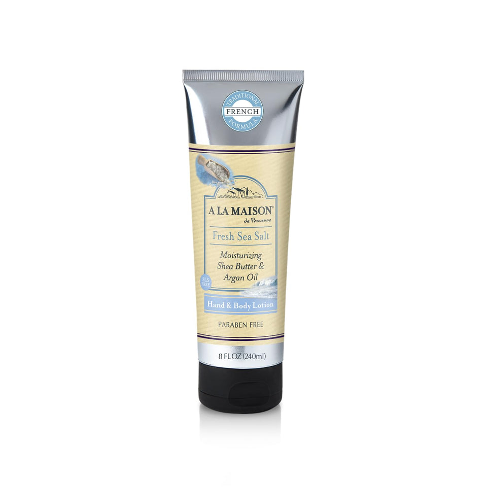 A LA MAISON front bottle showing sea salt lotion and fresh coastal design, highlights quick absorption