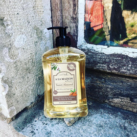 A LA MAISON bottle label with recycled plastic mark for eco benefit