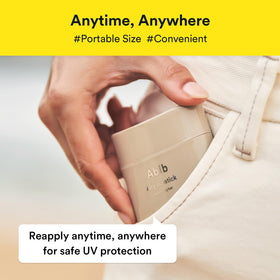 Abib sunstick inside purse conveying portability and easy reapplication