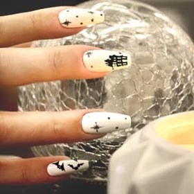 Abodhu trimmed and shaped coffin half-cover nails showing smooth edges and polish-ready surface
