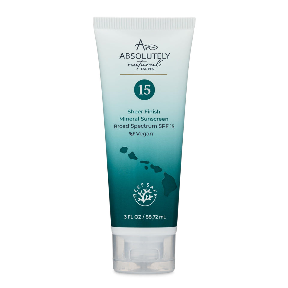 Absolutely Natural front packaging showing SPF 15 protection and compact size