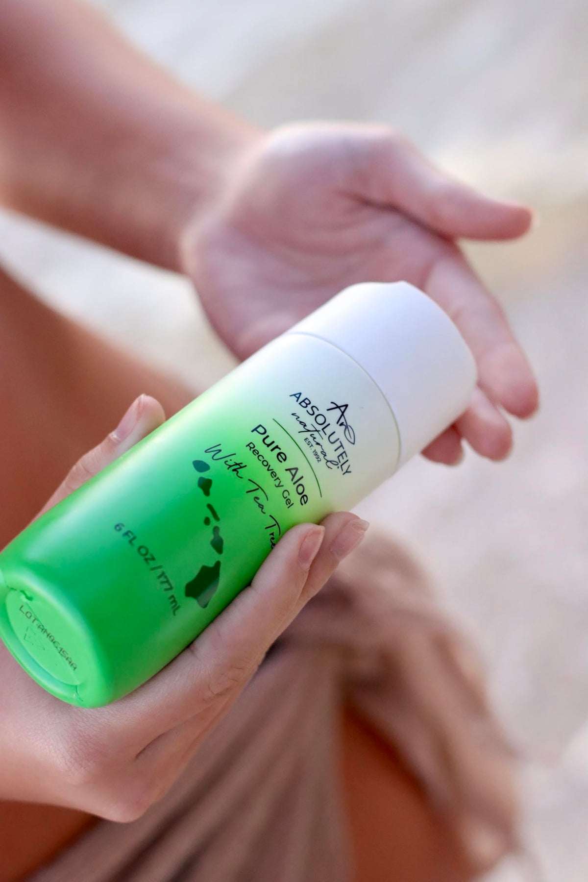 Absolutely Natural label ingredients detail showing vitamin E and eucalyptus benefits