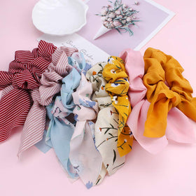 ACO-UINT scrunchie worn with spring outfit adding a playful accent