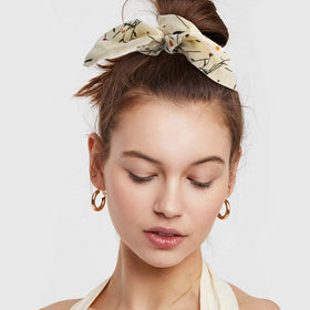 ACO-UINT scrunchie securing a thick ponytail for firm hold