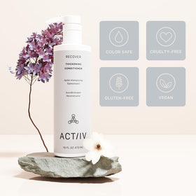 ACTIIV Recover conditioner being applied to damp hair to illustrate detangling and smoothing benefit