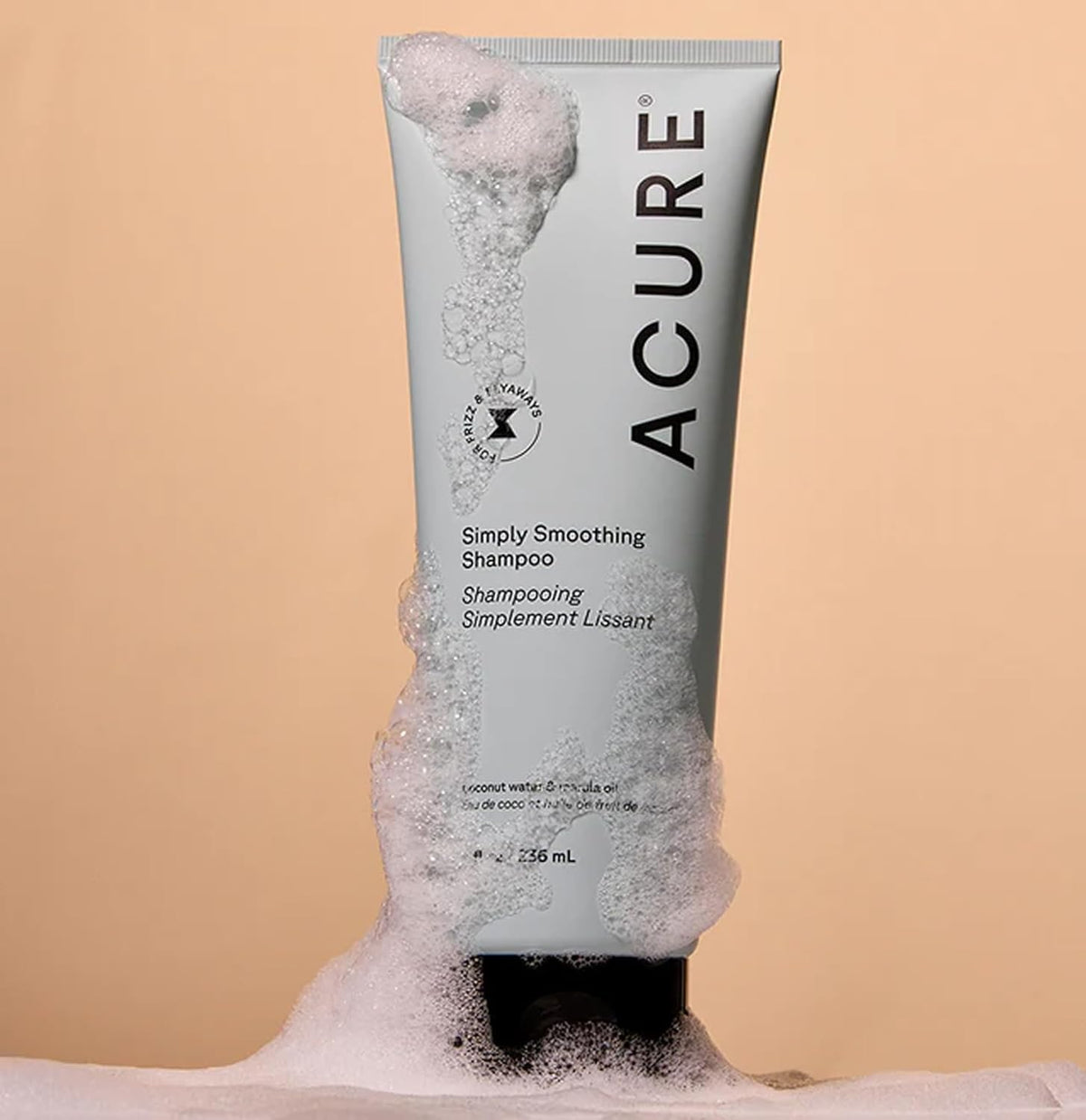 Acure coconut water pour showing lightweight hydration for hair