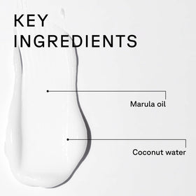 Acure conditioner being applied in hand to detangle and soften hair