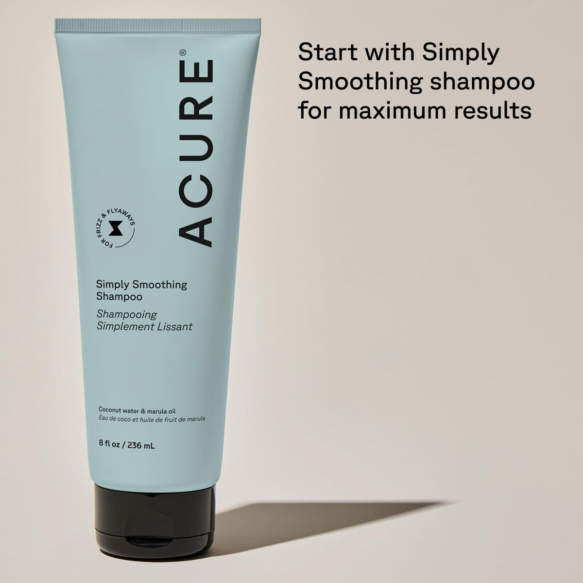 Acure 8 fl oz bottle next to common items to show true size