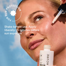 Acure sun serum applied under makeup for smooth, non-greasy layering