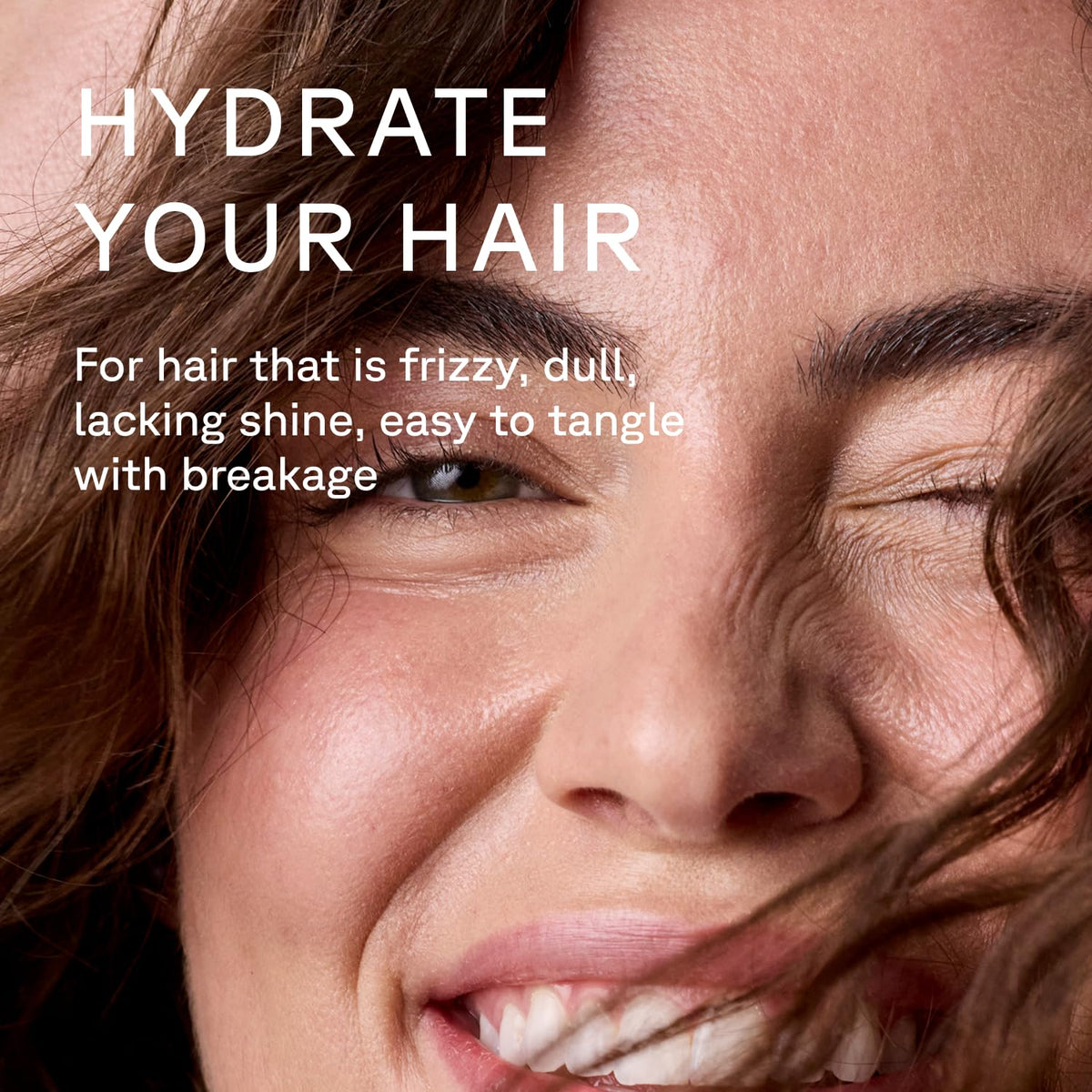 Acure creamy conditioner texture close-up showing smooth spreadability benefit