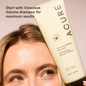 Acure conditioner applied in shower to mid-lengths adding body