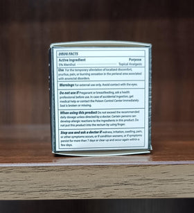 Adellina ingredients label close-up highlighting arnica and emu oil benefits