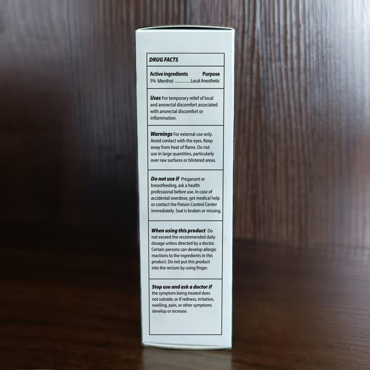 Adellina product beside ruler showing 2 fl oz size and travel convenience