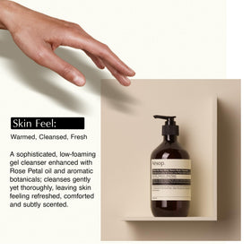 Aesop bottle held in hand to show 500 mL scale and practical sizing benefit