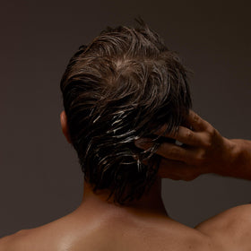 Aesop label close-up showing key ingredients and sustainable claims