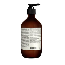 Aesop bottle next to hand illustrating 500mL size and everyday practicality
