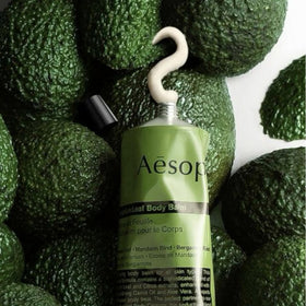 Close-up of Aesop ingredients list showcasing botanical extracts and transparency