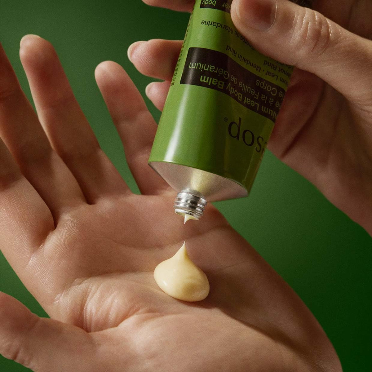 Label and lid of Aesop balm emphasizing premium packaging and clear usage