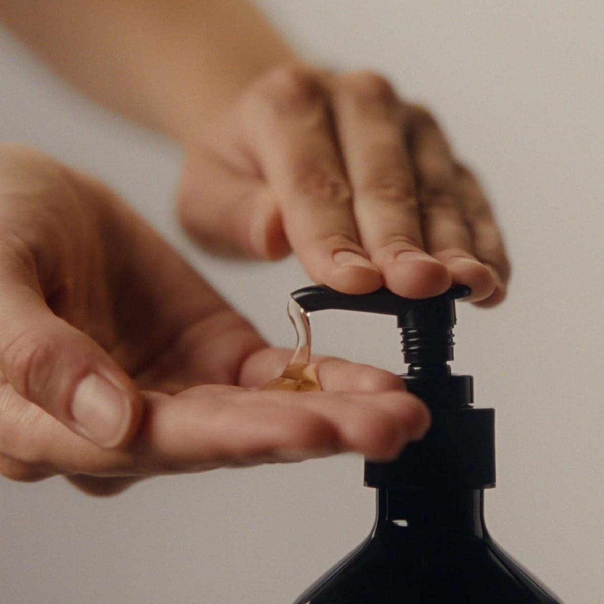 Aesop hand wash foam texture demonstrating gentle lather and effective cleanse