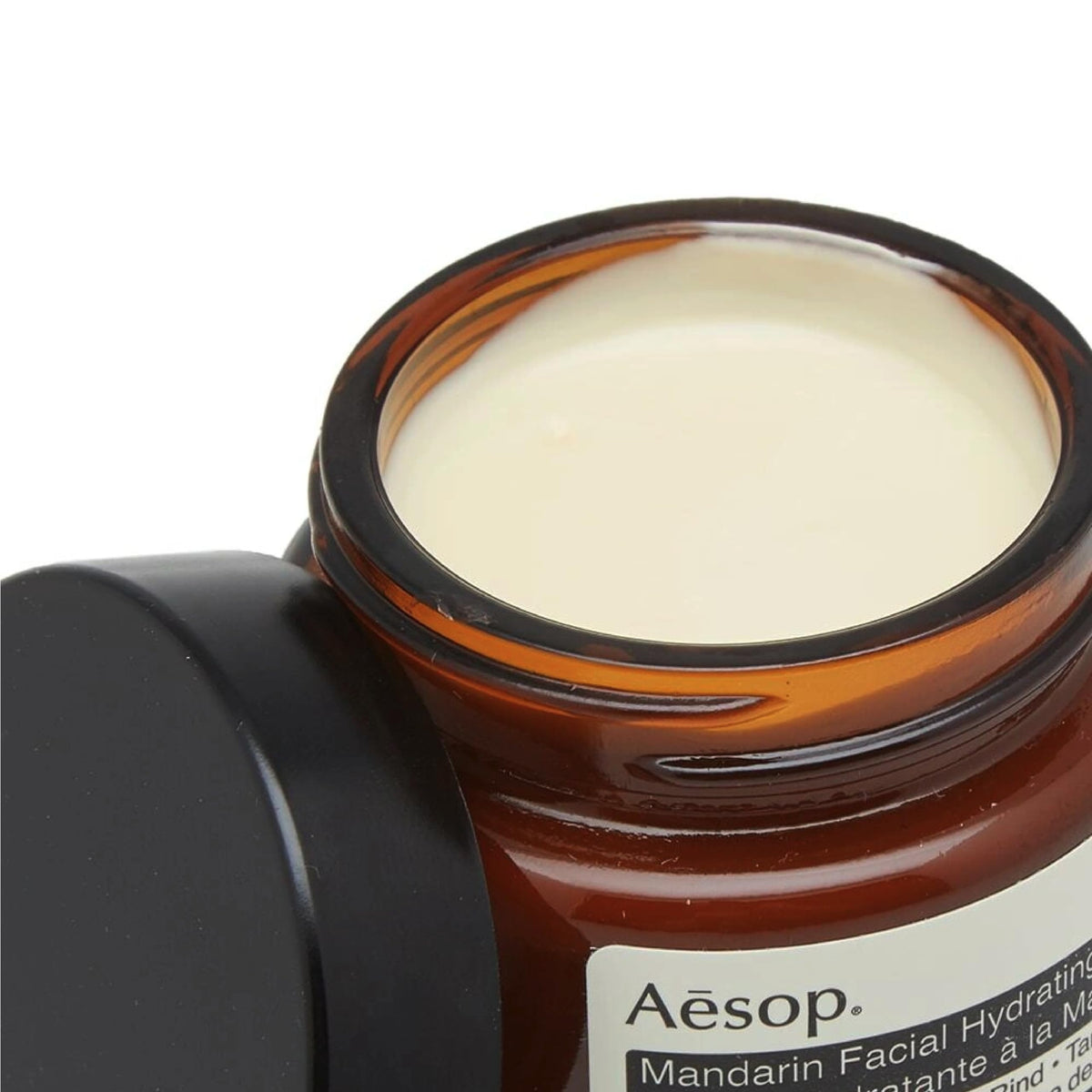 Aesop mandarin cream applied to hand demonstrating quick absorption and non-greasy feel