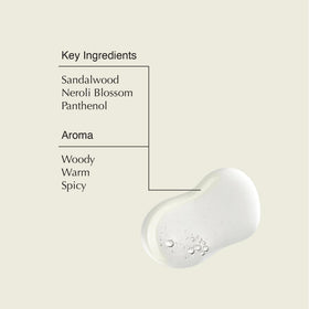 serum being dispensed from Aesop bottle into a palm demonstrating easy use