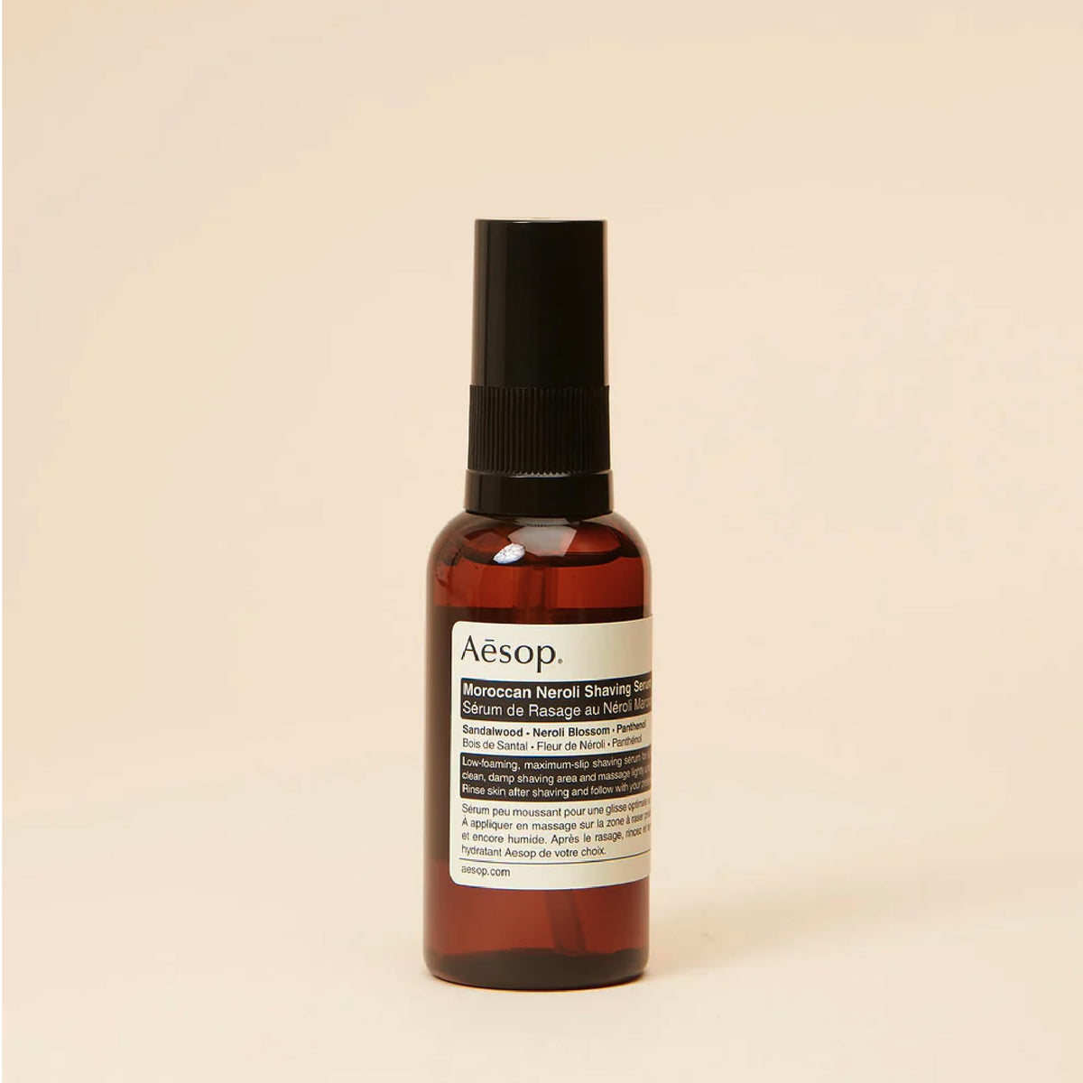 single drop of Aesop serum on skin showing smooth texture and slip benefit