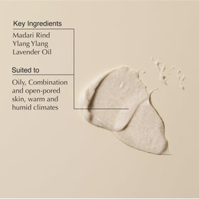 Aesop product applied to hand demonstrating creamy feel and easy spreadability