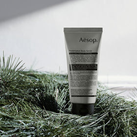 Aesop Redemption Body Scrub with sage leaf and pine needle ingredients highlighting purifying botanicals