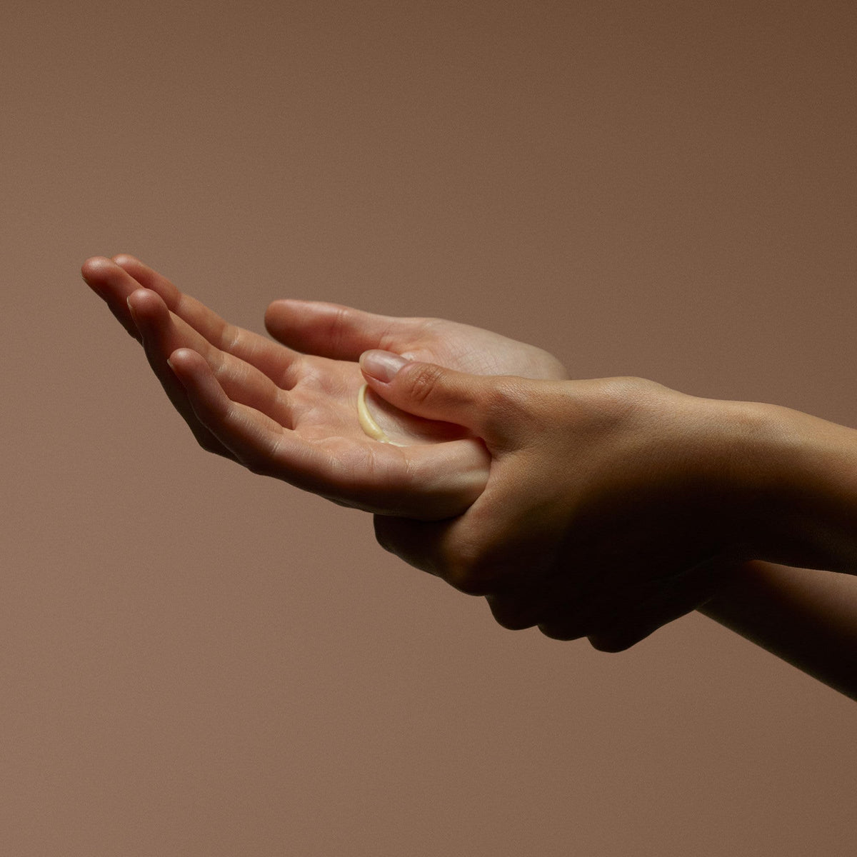 Aesop Reverence hand balm cream closeup illustrating rich emollient texture and hydration benefit