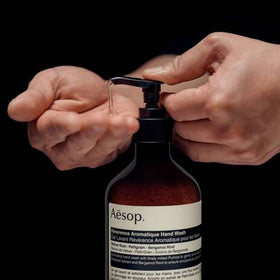 Aesop Reverence wash texture with fine pumice in lather demonstrating gentle exfoliation benefit