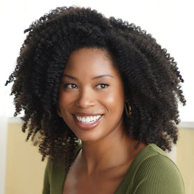 African Pride aloe and coconut water close-up highlighting natural moisturizing ingredients