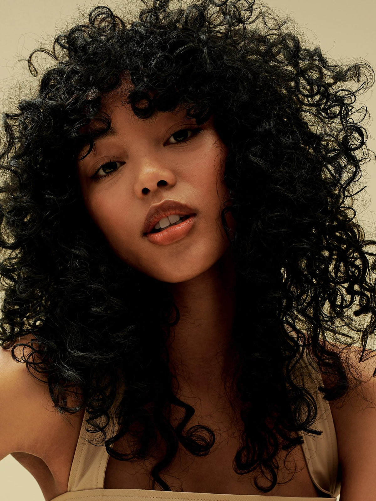 AG Care Curl Fresh shampoo texture on hand highlighting creamy, hydrating formula